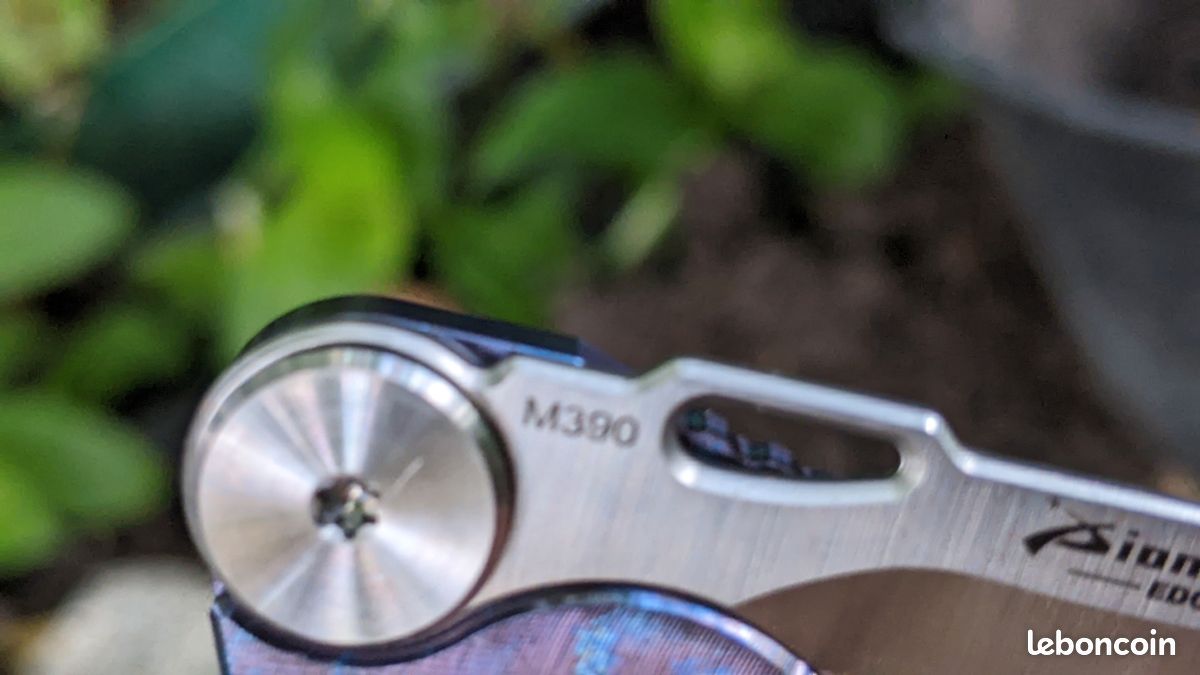 Mousqueton en titane équipé d'une lame en acier M390 (image 8)