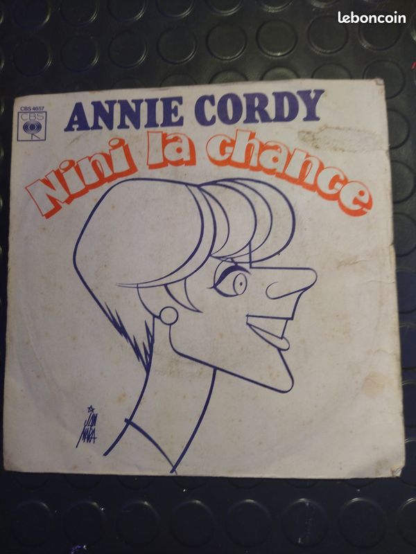 Disque 45 tours d'Annie Cordy intitulé "Nini la chance" Type de produit : 45 tours Artiste : Annie Cordy Titres : "Nini la chance"/"Dis pourquoi tu me bats léon" (bzh) (image 1)