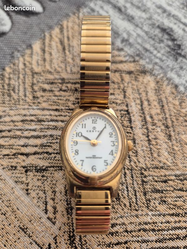 Montre Femme Certus Dorée à Quartz - Cadran Blanc, Calendrier Perpétuel - Occasion