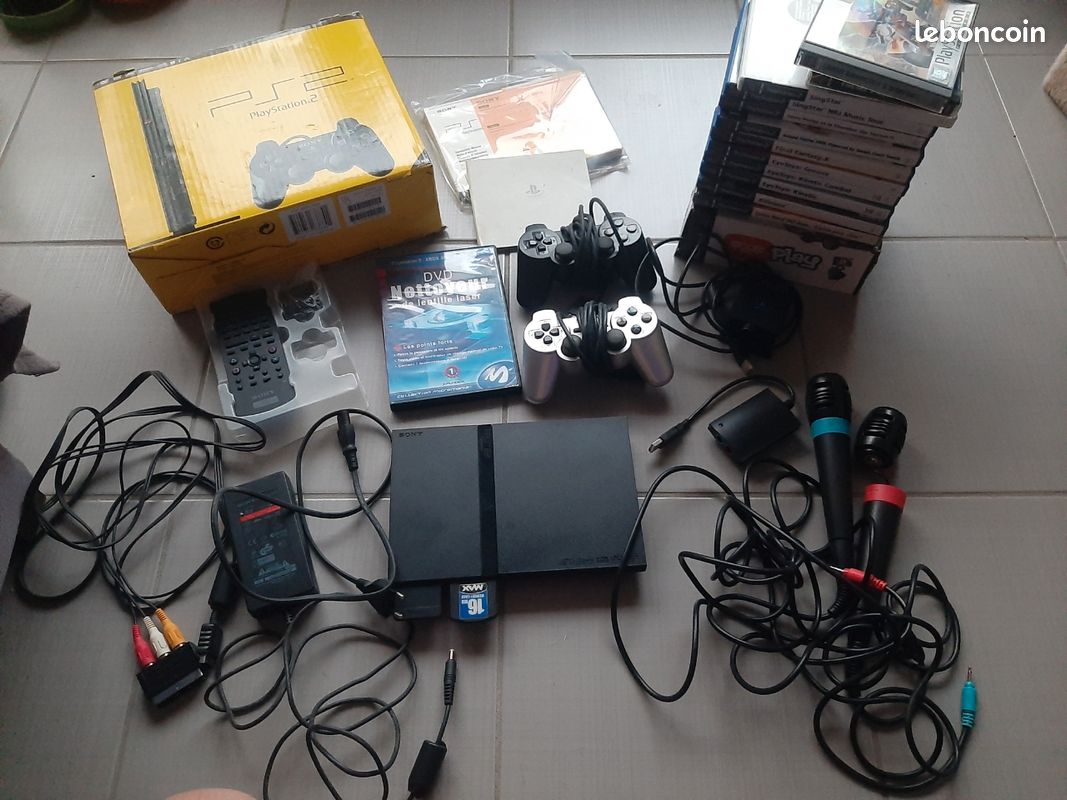 PS2 + divers jeux + caméra eye toy... (image 1)