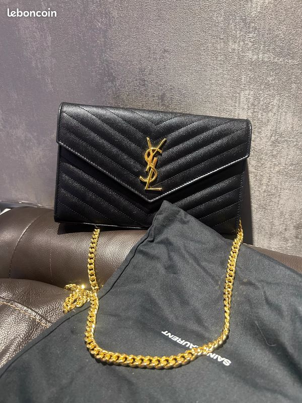 Sac enveloppe en cuir noir Yves Saint Laurent MONOGRAM (image 1)