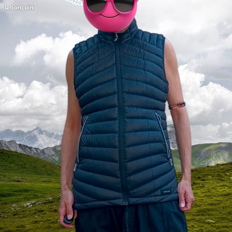 Doudoune femme noire femme sans manche en duvet MT100 forclaz