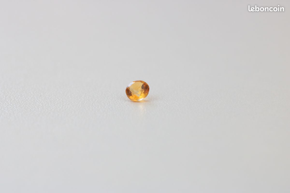 Citrine Ronde d'un Joli Jaune Orangé de 0.45 CARATS (image 1)