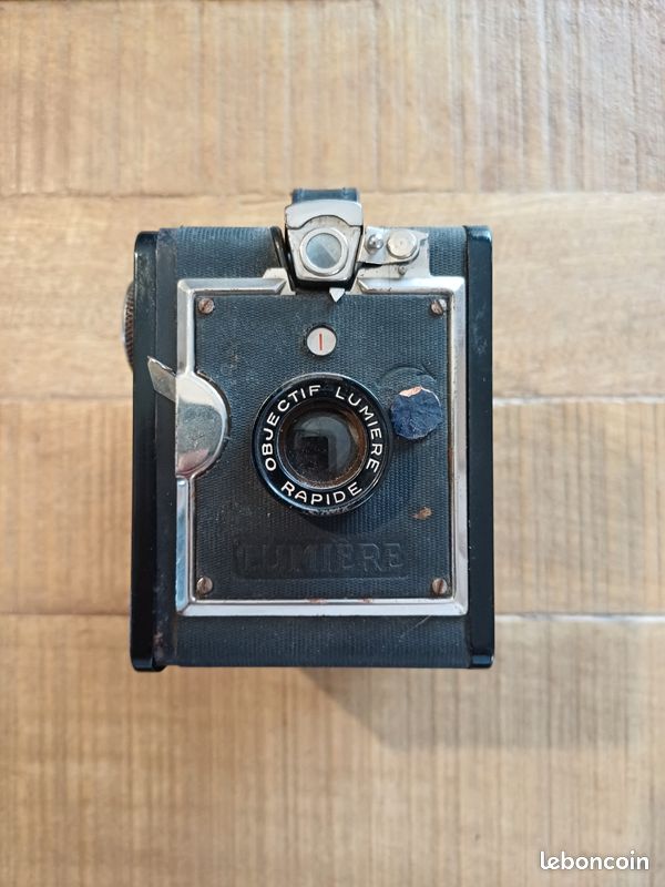 Appareil Photo Argentique Lumiere - Occasion - Marques D'usage Mineures