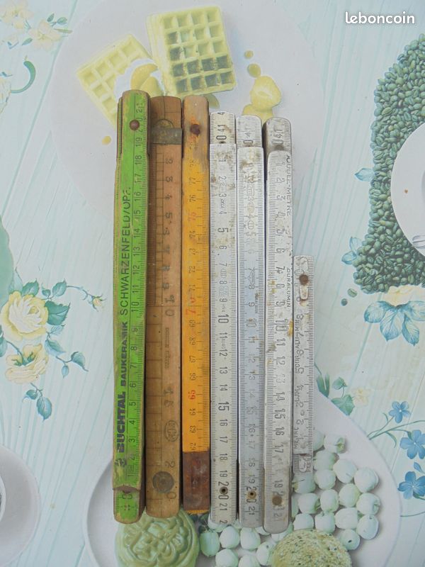 Mètres pliable en bois et métallique (image 1)