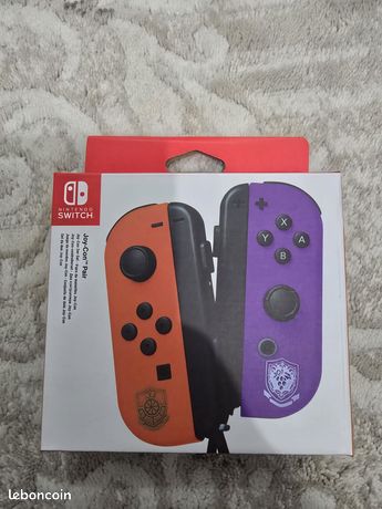 Manettes Joy-Con Nintendo Switch - Couleurs Rouge/Violet Officielles - Neuf Sous Blister