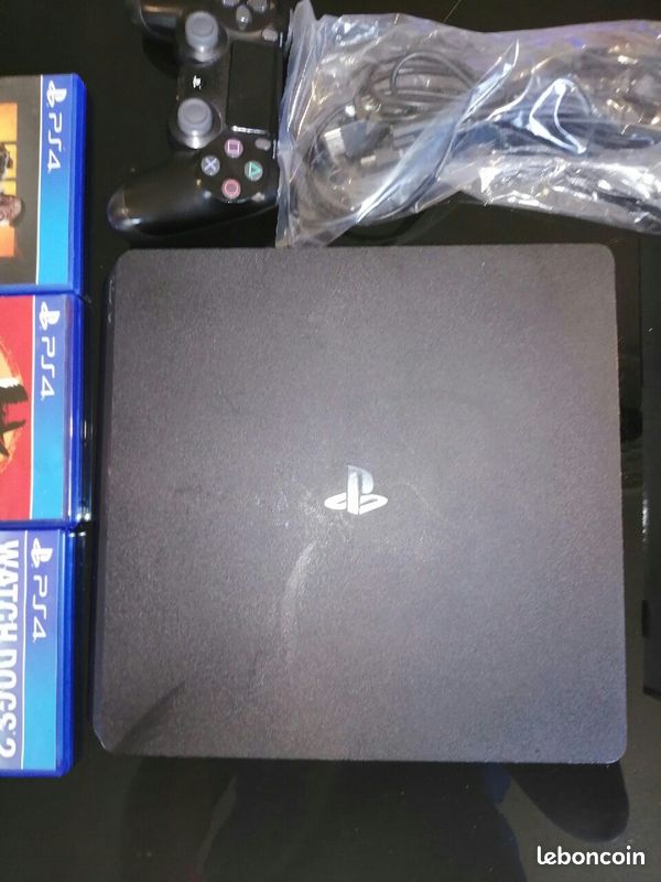 PS4 Slim + 3 jeux (image 2)