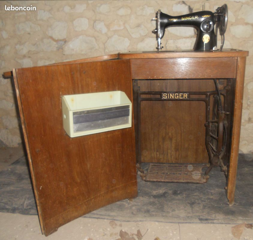 Machine à coudre dans meuble (image 1)