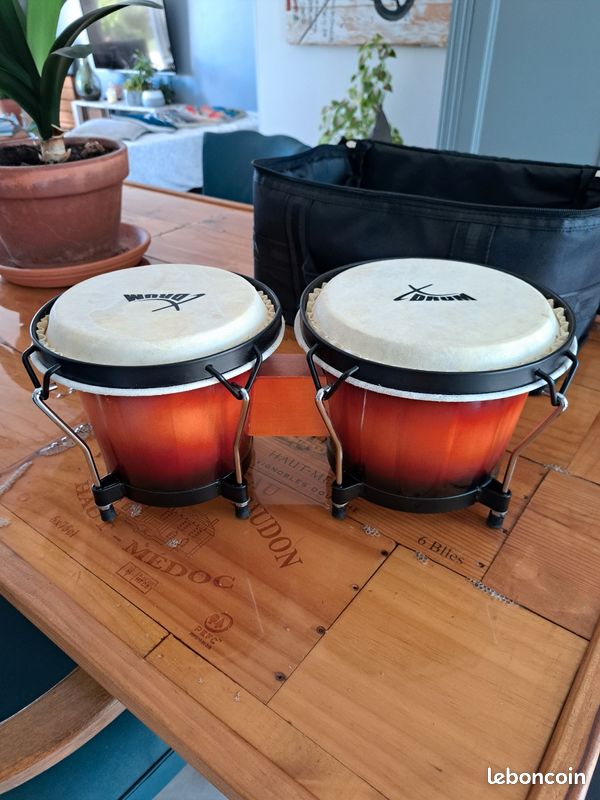 Système Accordage Pro Bongos XDrum Club Standard Naturel - Set Avec Housse - 6 Et 7 - Peaux Naturelles Bongos Percussion Cubaine Système Accordage Pro Bongos XDrum Club Standard Naturel - Set Avec Housse - 6 Et 7 - Peaux Naturelles Bongos Percussion Cubaine
