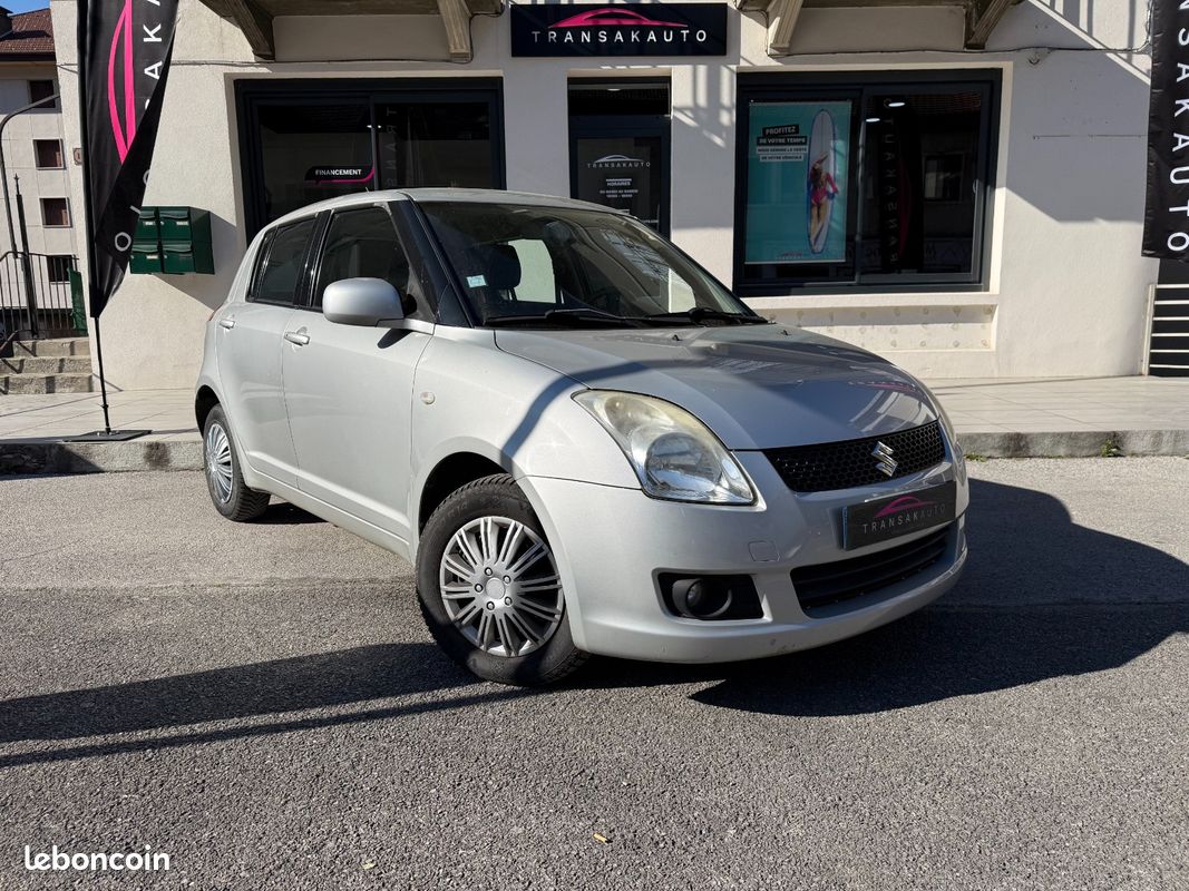 SUZUKI SWIFT 1.3 GLX 4x4 (image 1)
