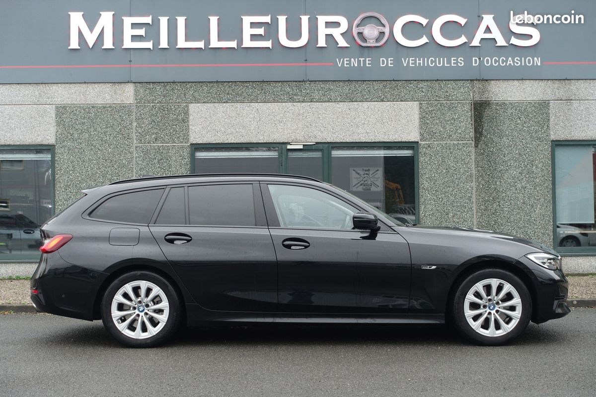 320ea Touring Hybride Rechargeable 204ch E-Drive BVA Live cockpit/Cuir Sport chauffant/Gps Europe/Caméra/Carplay/Hayon électrique/Accès confort/1*Main/Garantie 12 mois (image 4)