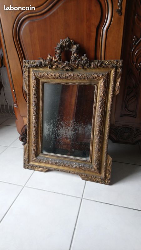 Miroir ancien en bois sculpté (image 1)