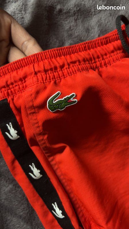 Bas Lacoste rouge Vêtements