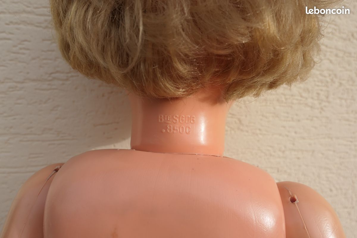 Grande poupée blonde ancienne de 80 cm en celluloïd et aux yeux mobiles