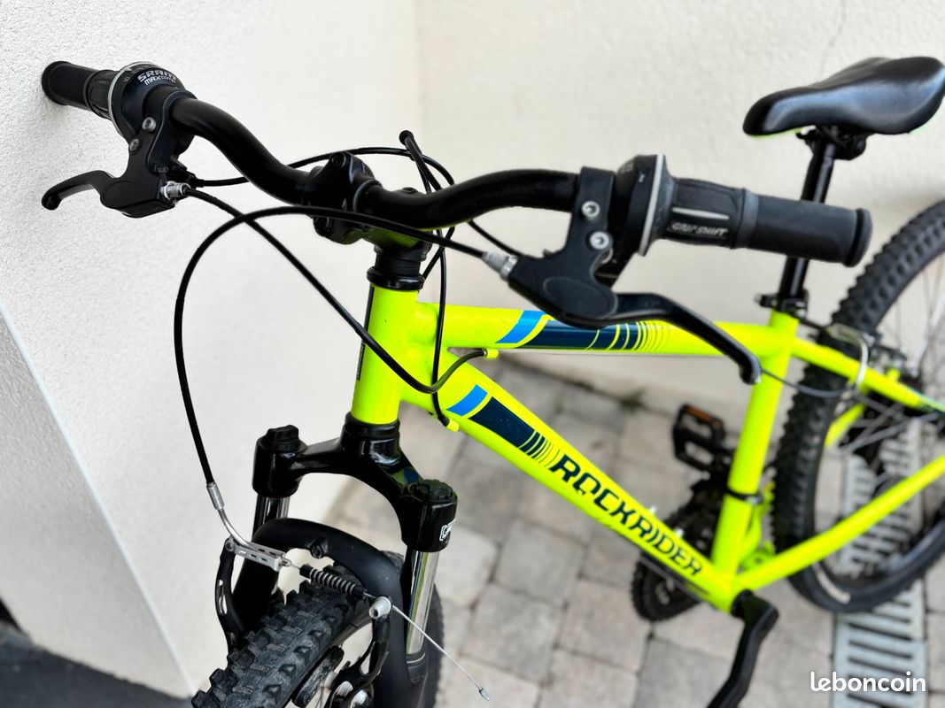 VTT ENFANT ROCKRIDER ST 500 24 POUCES 9-12 ans Fluo Vélos