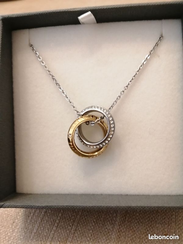 Pendentif anneaux entrelacés plaque or et argent Montres Bijoux