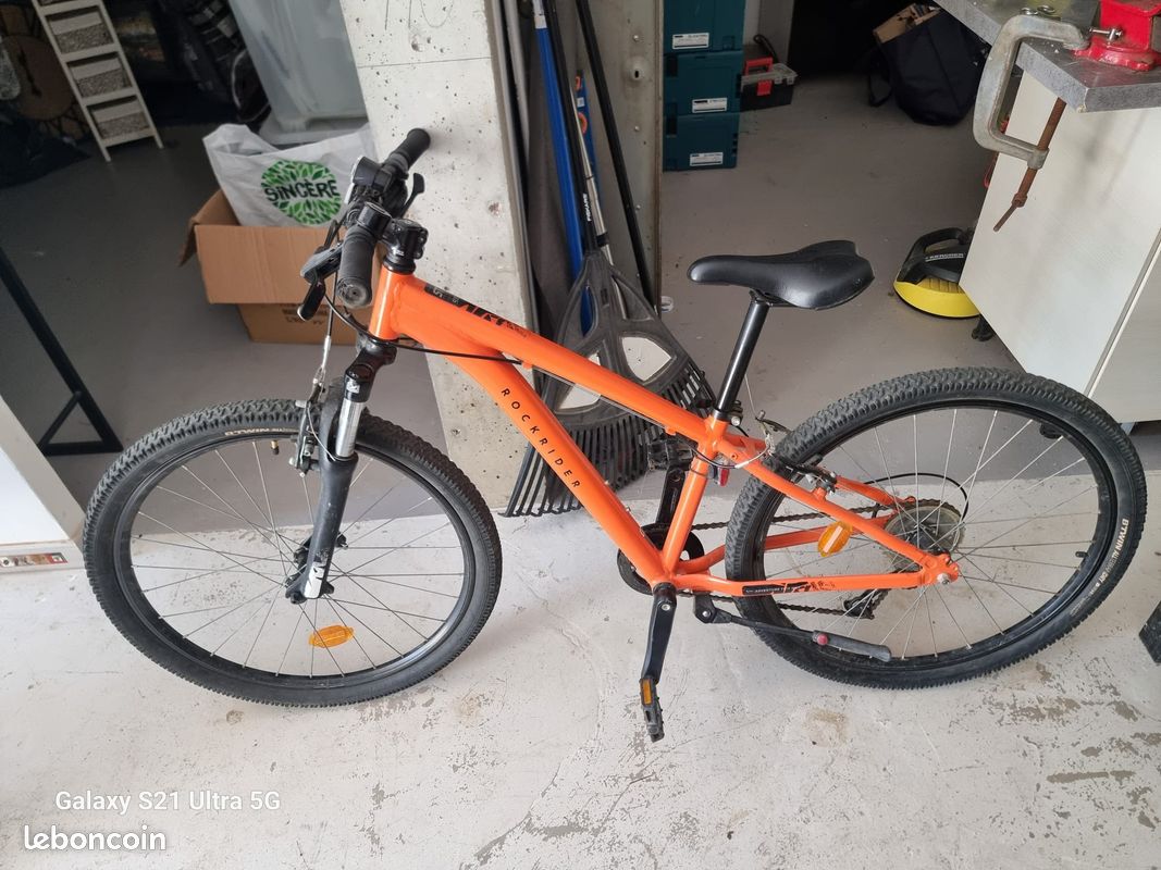 B Twin Rockrider St 100 Orange 20 Inch Rockrider 500 Orange 20