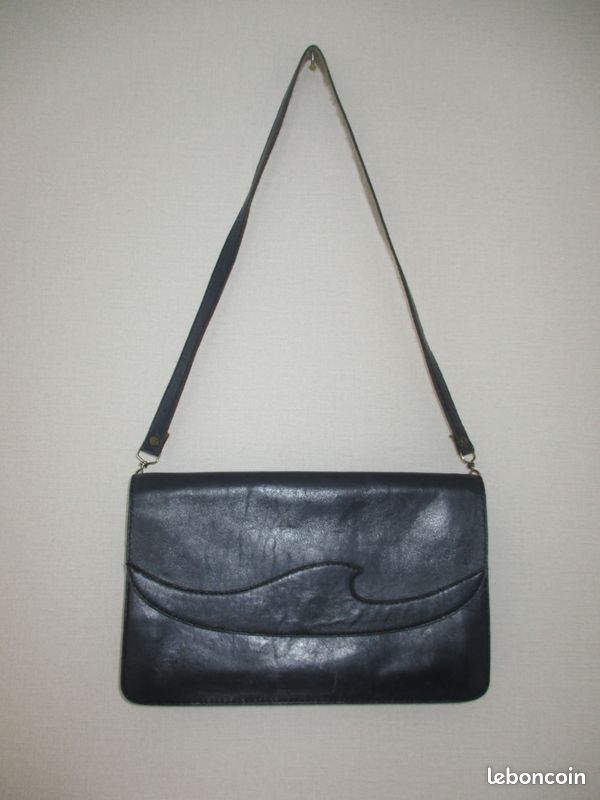 Sac à mains pochette en cuir (image 1)