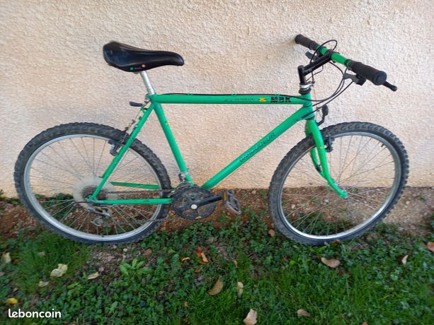 VTT MBK Femme 18 Vitesses - Cadre Acier, Suspension Avant Rock Shox