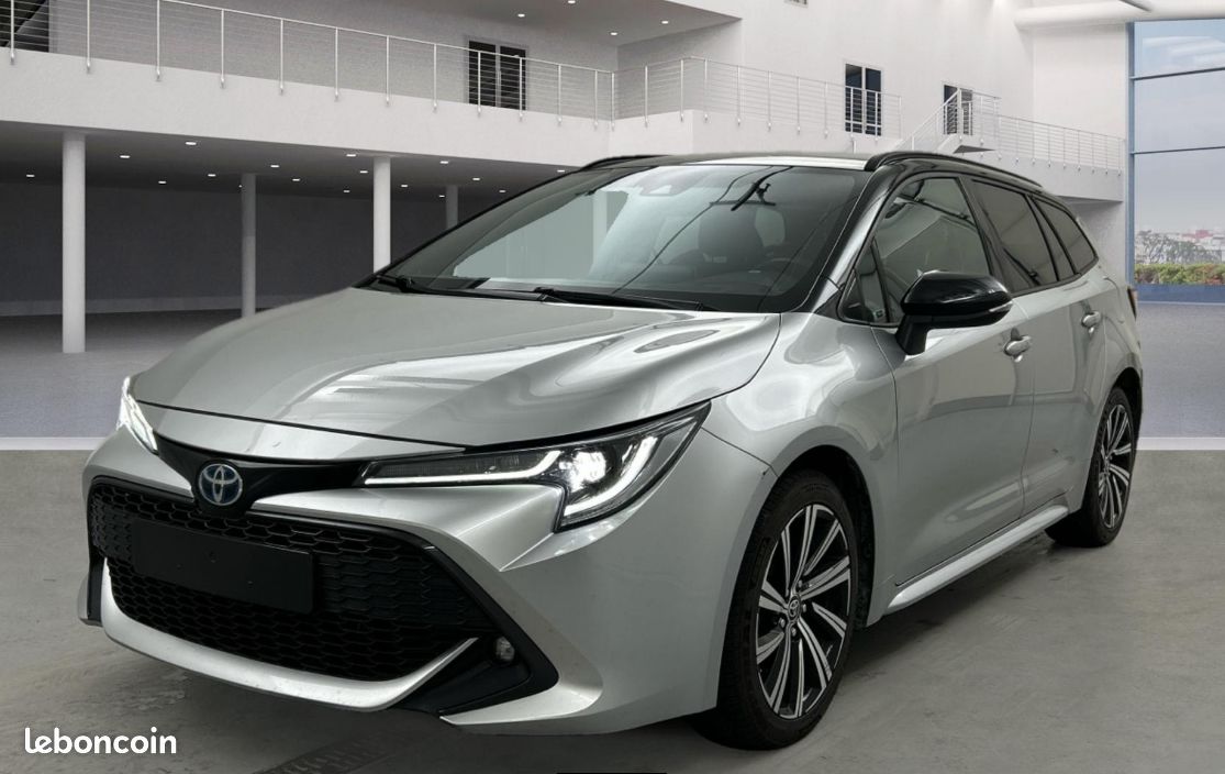 TOYOTA COROLLA TOURING 1.8i 122 HK HYBRID SPORTS ACTIVE PREMIUM CVT 22 990 ou 385/MOIS (image 2)