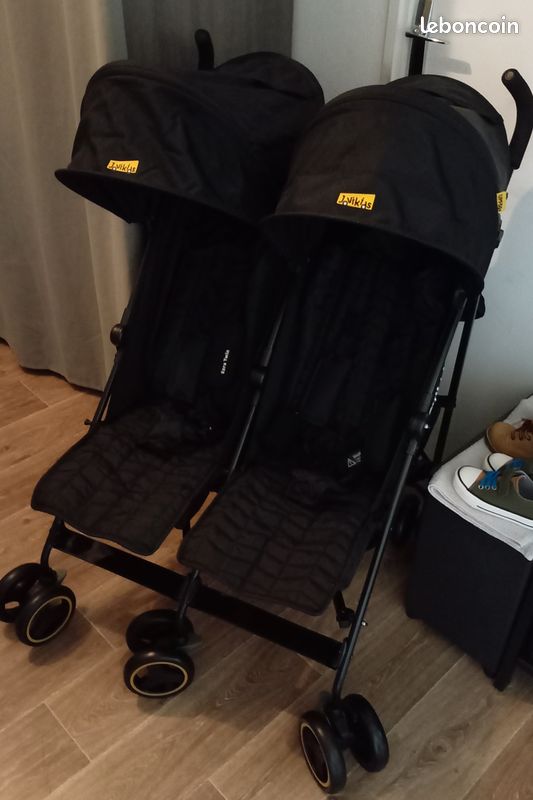 Poussette double neuve (image 1)