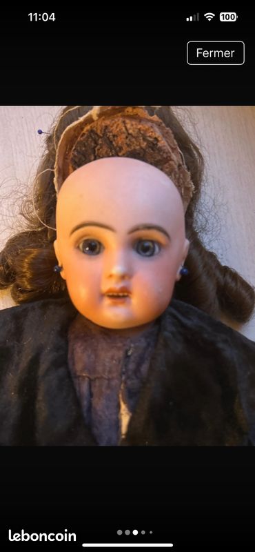 POUPEE tête en porcelaine marqué en rouge tête