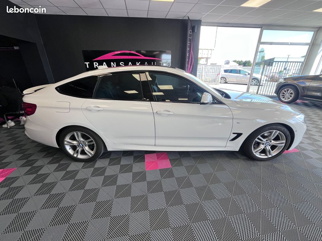 BMW SERIE 3 GRAN TURISMO F34 330d xDrive 258 ch M Sport A. Toit ouvrant / Caméra de recul / Hayon électrique / (image 8)