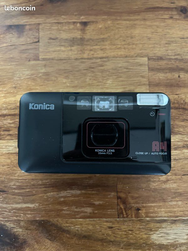 Appareil Photo Konica A4 D'occasion - Fonctionnel, Avec Quelques Marques D'usure, Modèle Vintage