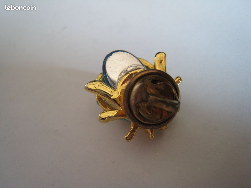 Broche vintage coccinelle émail bleu rouge et strass