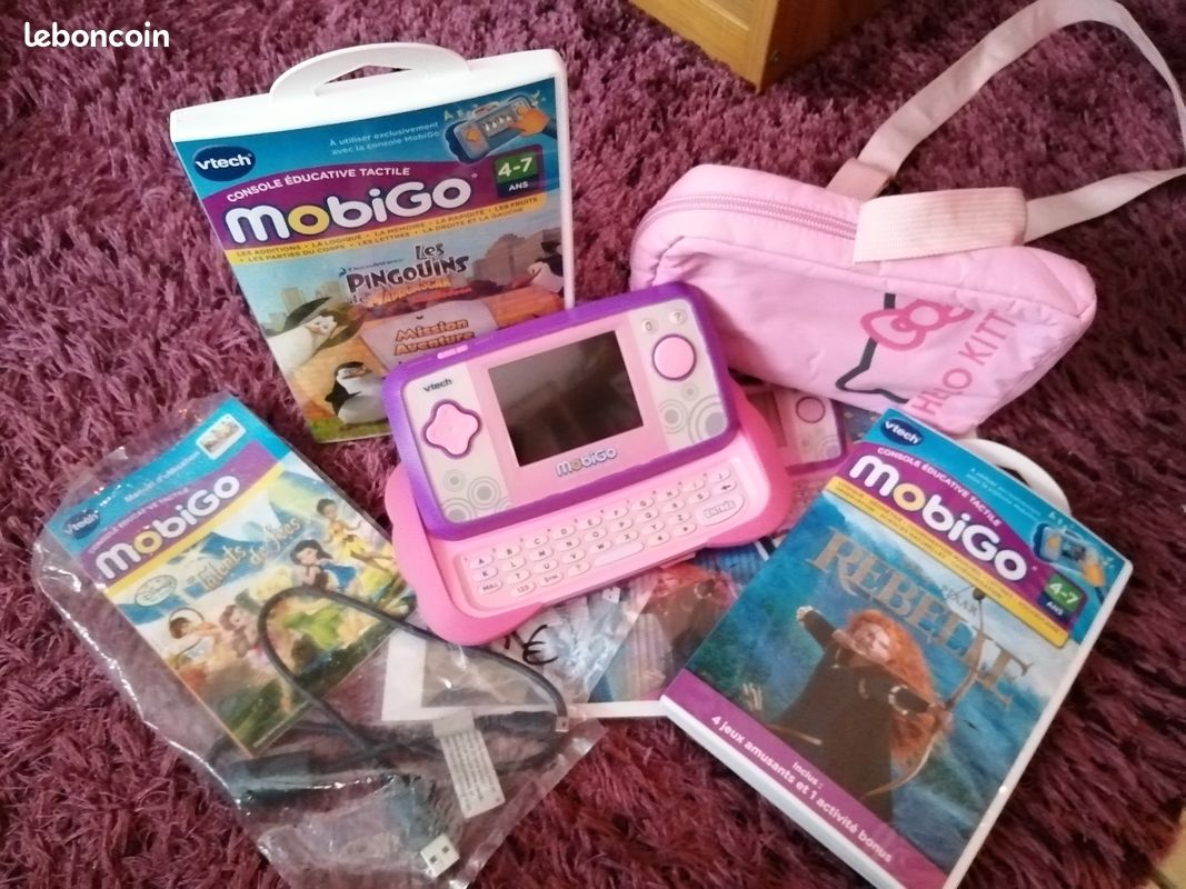 Vend mobigo + 3 jeux + house rangement (image 1)