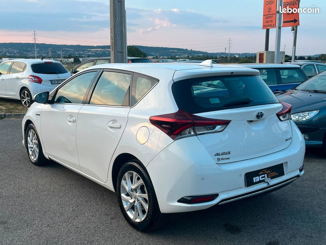 TOYOTA AURIS (2) Hybride 1.8 VVT-i HSD 136H DYNAMIC BUSINESS ( TVA Récupérable ✅- Boite Auto🕹️- Crit’air 1 🟣 - Garantie & Révisée ✅ ) (image 4)