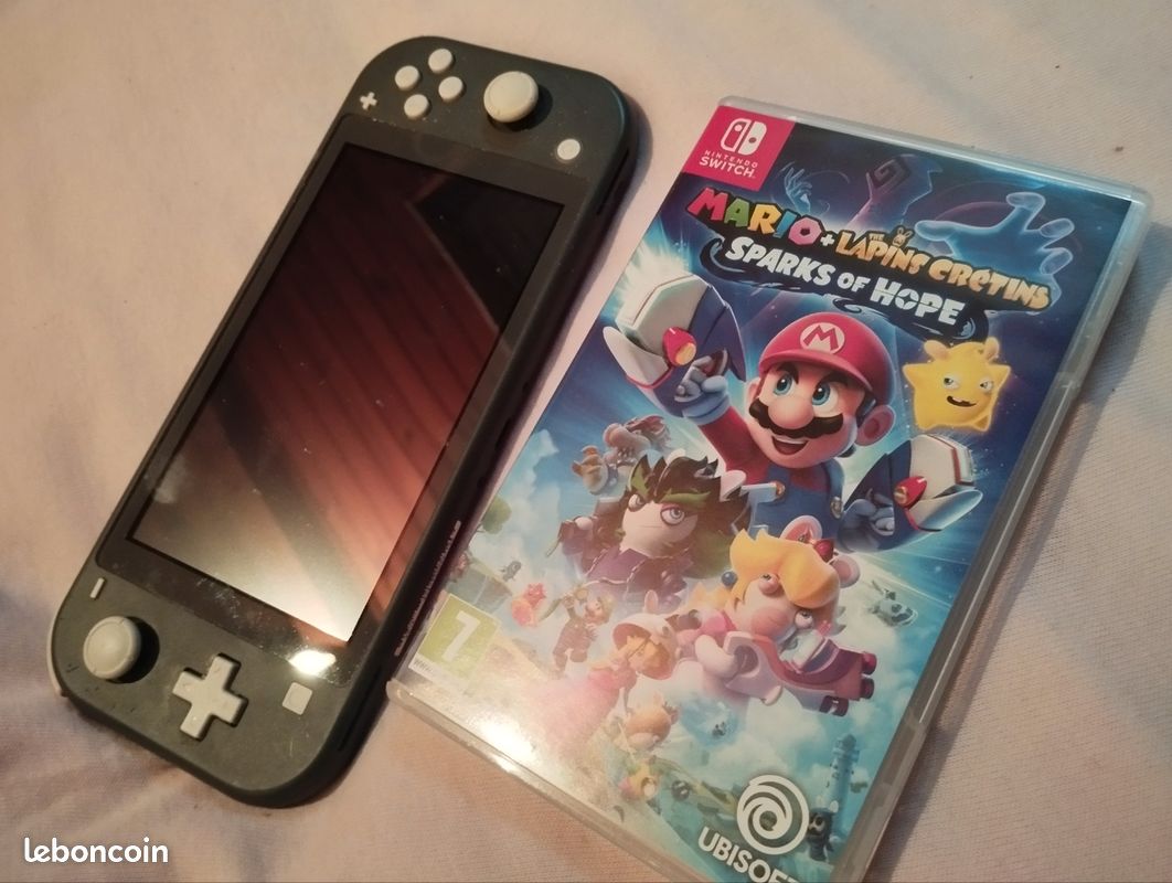 Switch lite grise avec jeu mario (image 1)