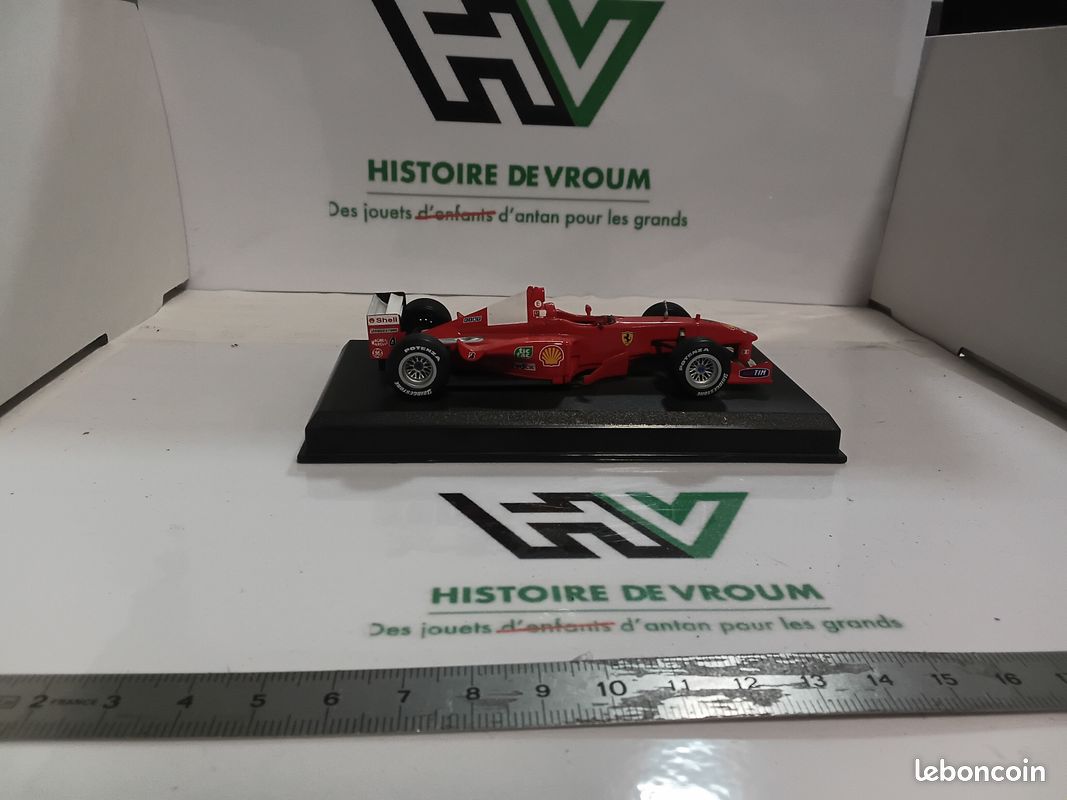 Ferrari F399 rouge numéro 4 de 1999 - Formule 1 - Eddie