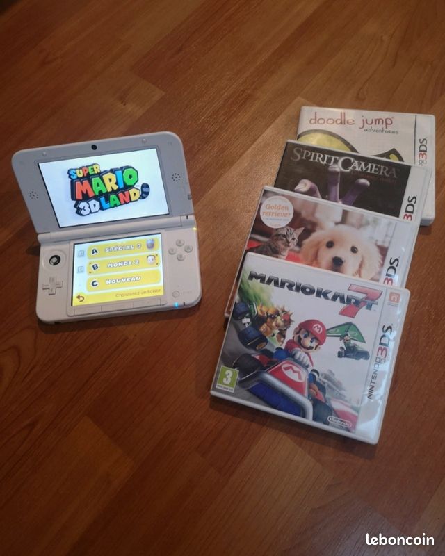 Nintendo 3ds XL blanche +jeux (image 1)