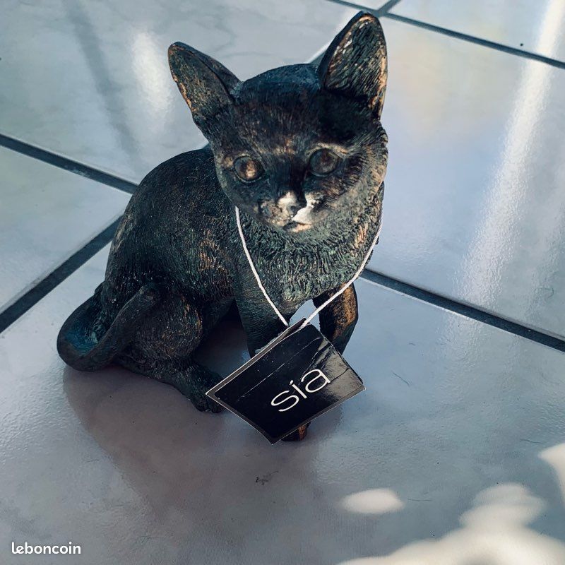 Statuette chat allongé en céramique zoya (noir et or