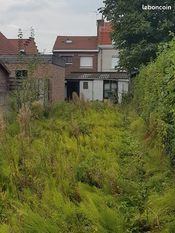 Garage sur un terrain constructible