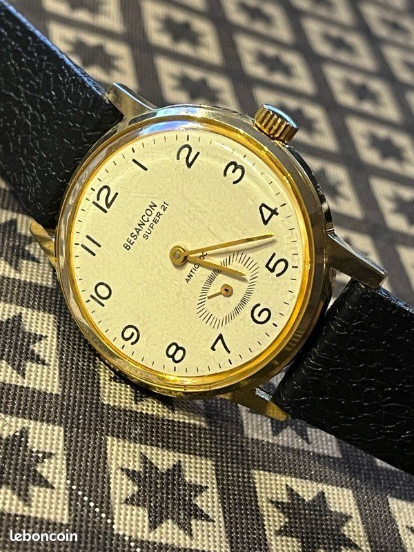 Montre Homme Besançon Quartz - Cadran Argenté, Bracelet Cuir Noir, Style Classique Intemporel