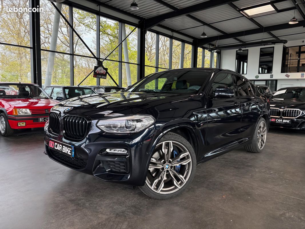 BMW X4 M40i 354CH Carbonschwarz Entretiens complets BMW Attelage Toit Ouvrant Harman Kardon Sièges électriques Caméra 360 21P Garantie 6 ans 559/mois (image 1)