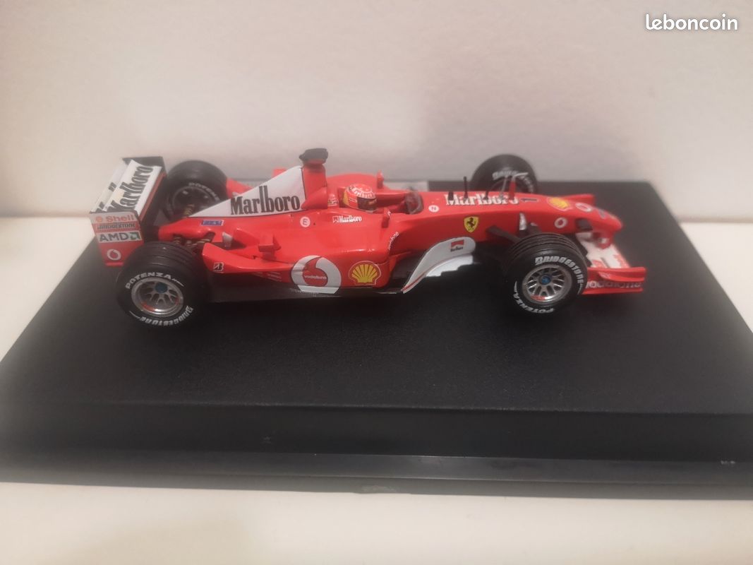 HOT WHEELS FERRARI F2002 Michael Schumacher 1:43 Voiture EUR 15,00
