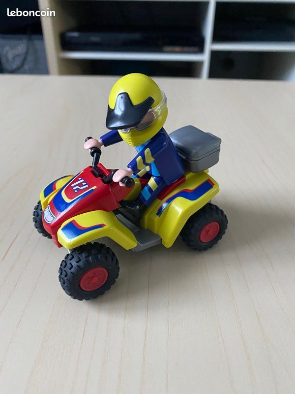 Playmobil Les aventuriers 4425 Pilote et quad rouge (image 1)