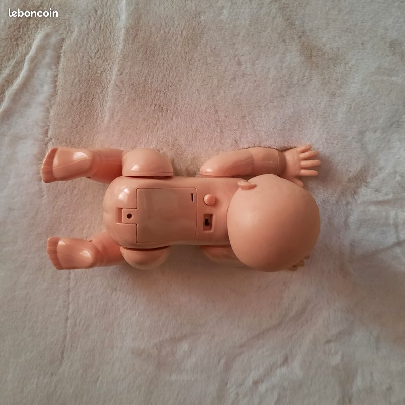 Jouet poupon qui avance à 4 pattes, il rit, il pleure (image 2)