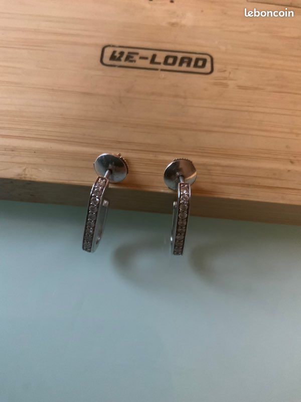 Boucle d oreille din van (image 1)