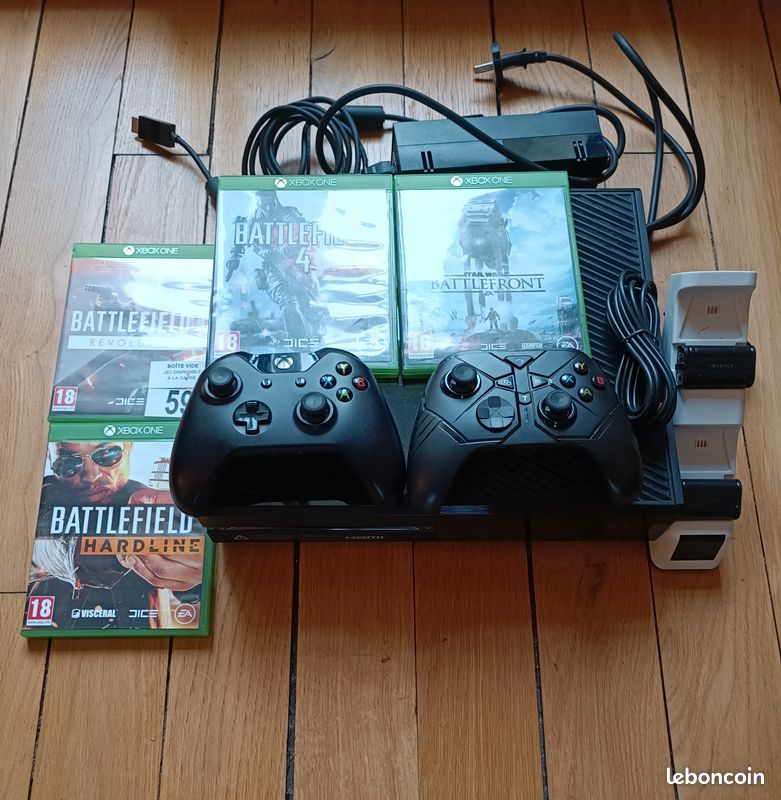 Xox one + 2 manettes + Chargeur + 4 jeux (image 1)