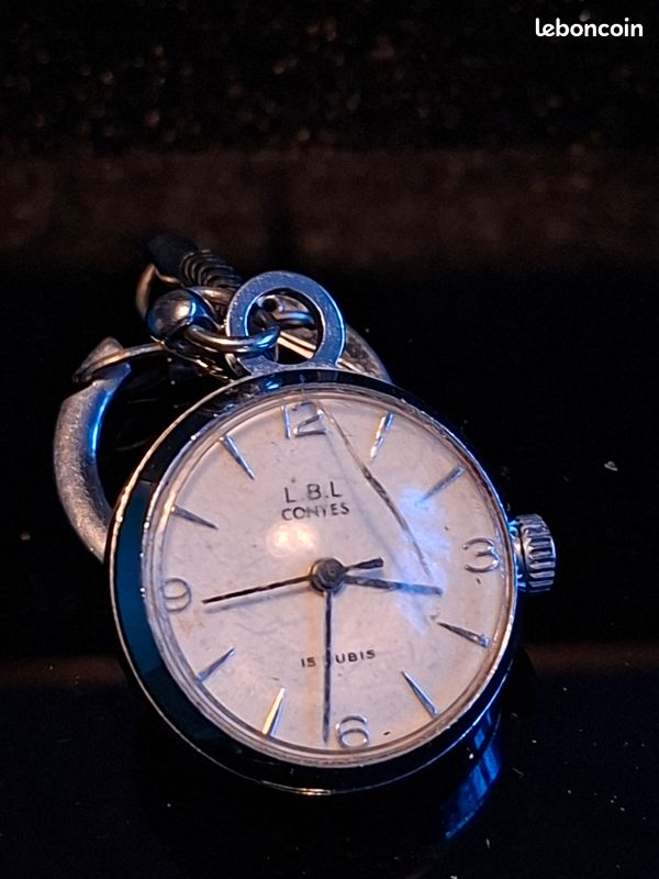 Montre Porte-clés Poclain Mécanique - Fonctionne, Dorée Et Noire, Occasion