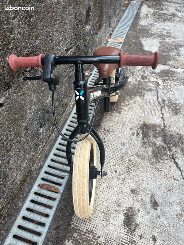 Draisienne à ans Décathlon runride 520 10 pouces Vélos