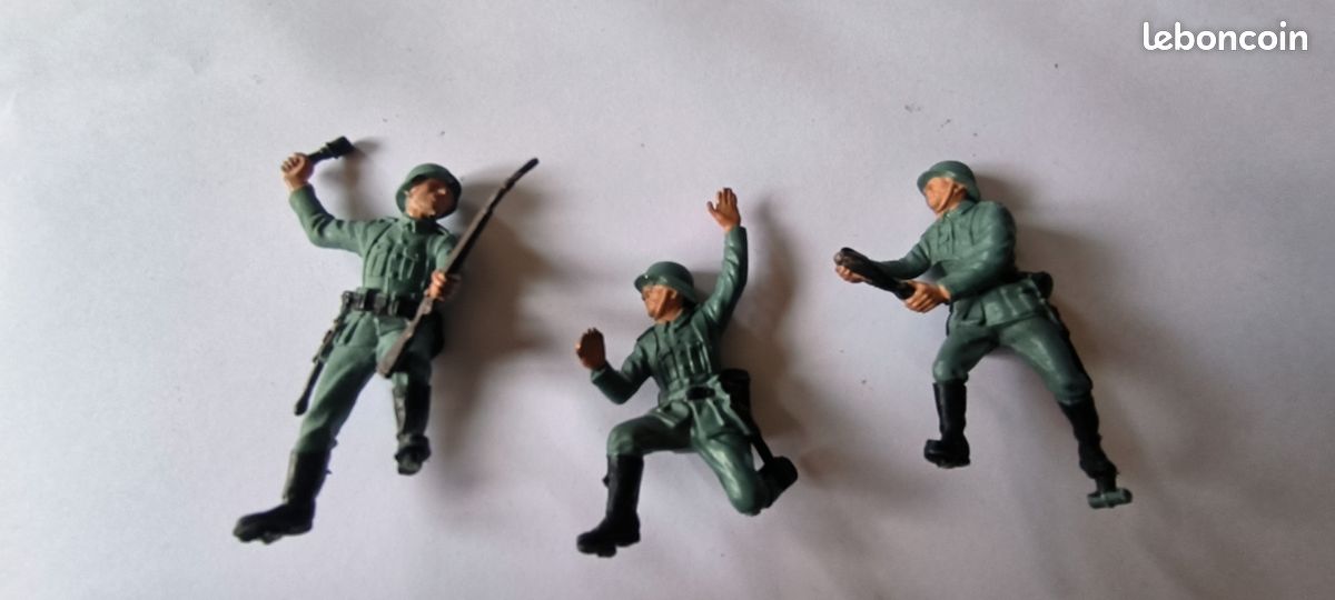 A collection of Britains Deetail model military figures; twenty British and twenty-two German