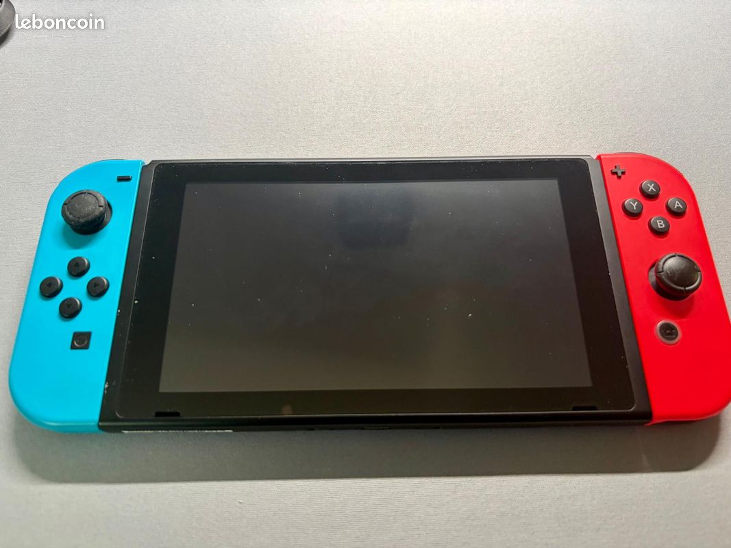 Nintendo Switch 1 complète en très bon état + sacoche Mario Kart + boîte d'origine (image 2)