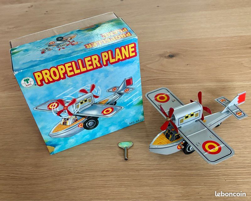 Jouet mécanique tôle lithographiée : Vintage plane, avion Air