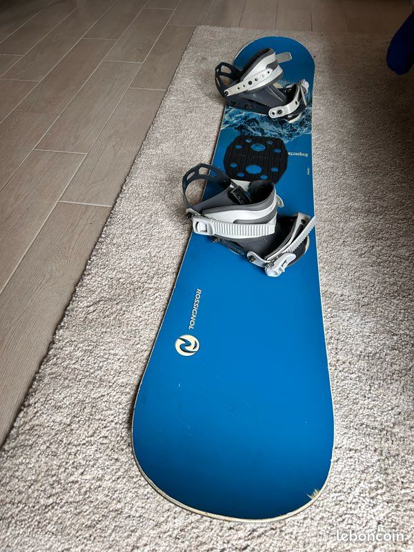 Snowboard vintage Rossignol Dualtec 156 entreten par un pro