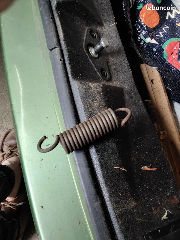 Ressort neuf avec attaches inversess (image 1)